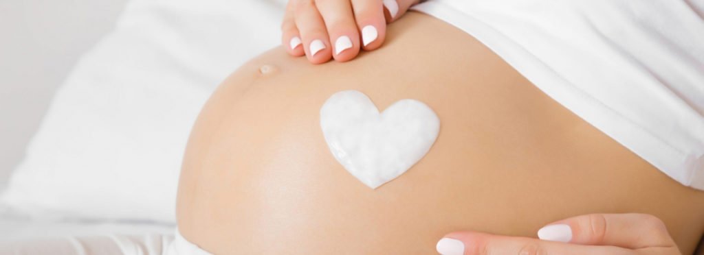 The stomach of a Pregnant lady | Get guidance in skincare during pregnancy at Beauty Boost Med Spa in Newport Beach, CA