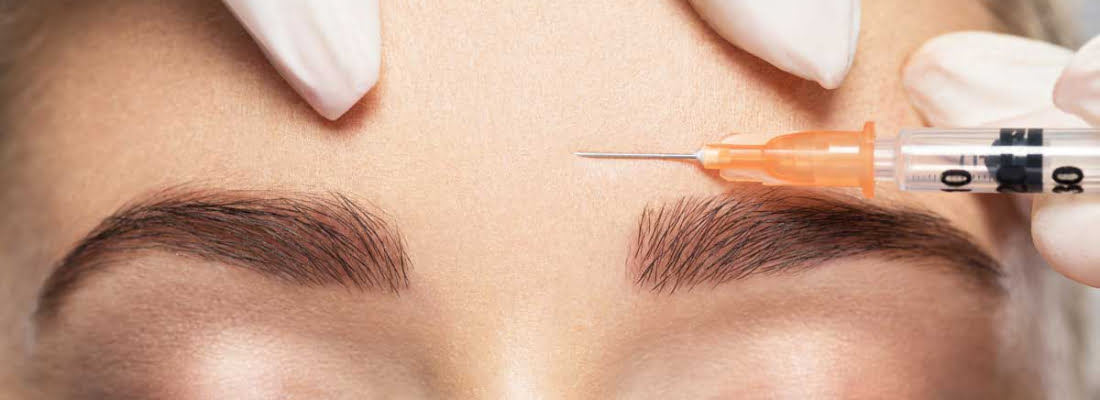 A Woman taking injection on forehead | Get a guide about Botox treatment in Beauty Boost Med Spa at Newport Beach, CA
