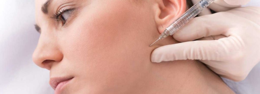 A Lady receiving injectable on jawline | Get to know about fillers in Beauty Boost Med Spa at Newport Beach, CA